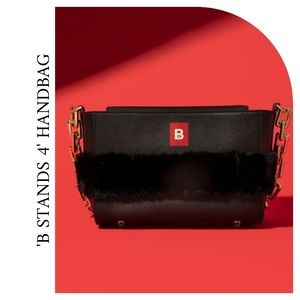 Beautiful elegant leather mini handbag, with gold plated chain link.